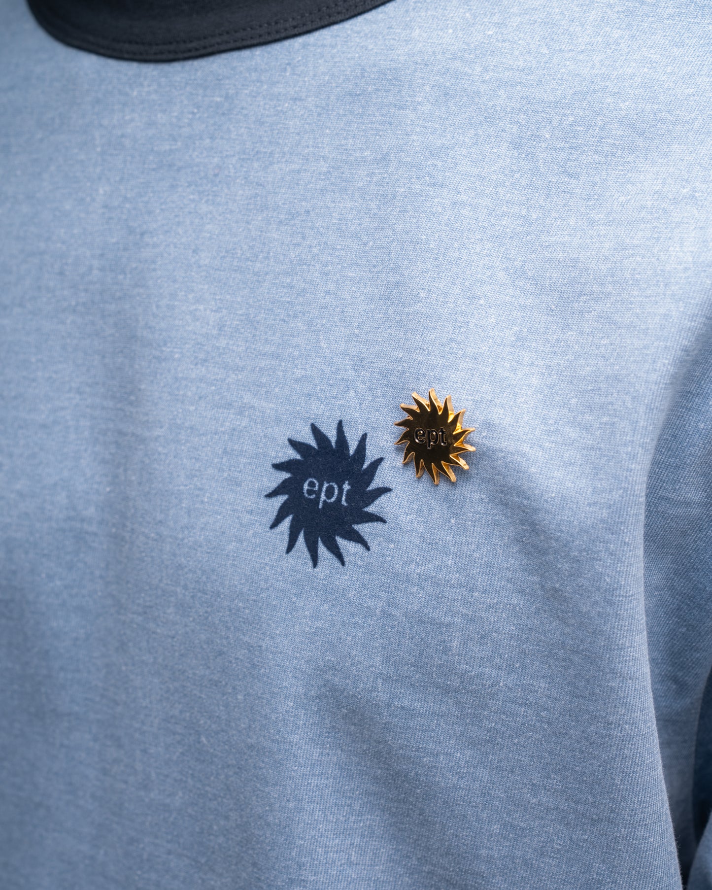 Sun Logo Pin Badge